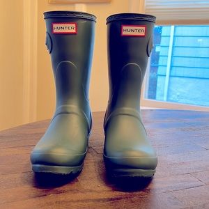 Hunter rain boots.